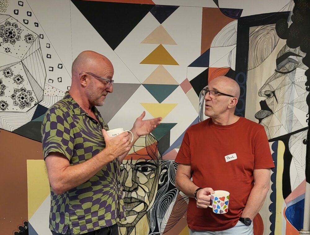 Ecas Befriender Paul (right) speaks with Ecas Befriending Assistant, Gary (left)